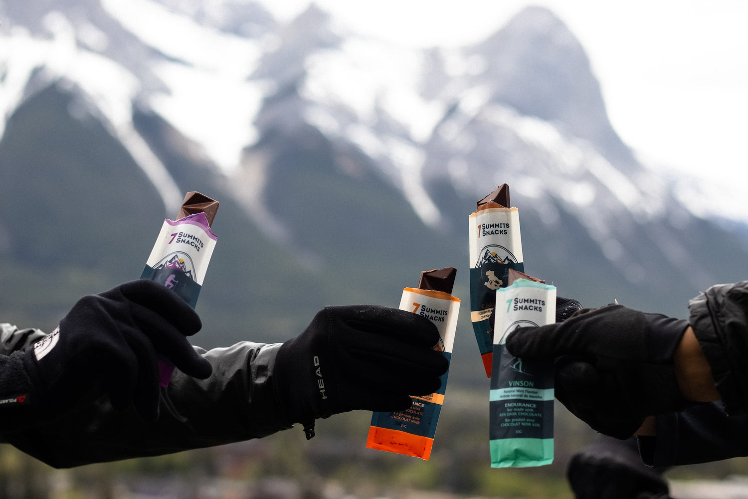 Several Endurance Athletes Showing Which Chocolate Energy Bar They Prefer - 7 Summits Snacks
